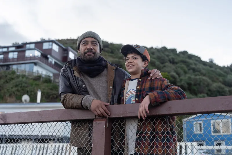Dominic Ona-Ariki wears a beanie and heavy knit on the Wellington coast