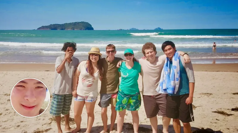 Six members of the anime club stand together on a large beach