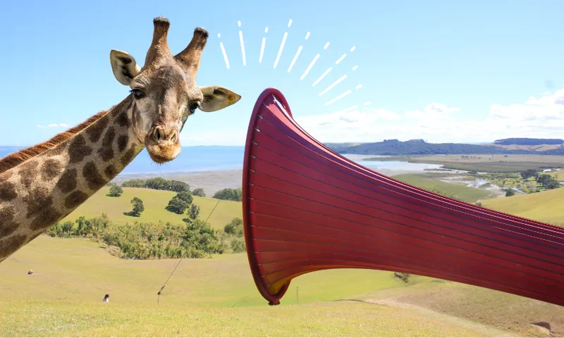 a big red trumpet-like sculpture in a pastoral landscape and a giraffe