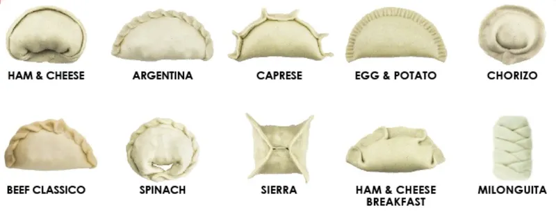 two rows of empanadas showing the different ways to seal the edges of the pastry