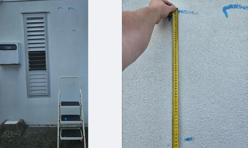 a white wall with a stepladder in front of it and a measurement showing more than 50cm