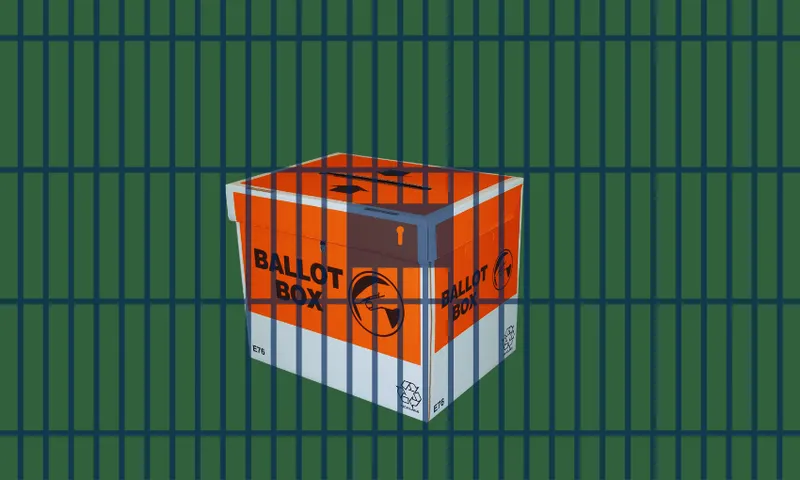 An orange ballot box sits behind dark blue prison bars, symbolizing restricted or denied voting rights. The background is green with a grid pattern.