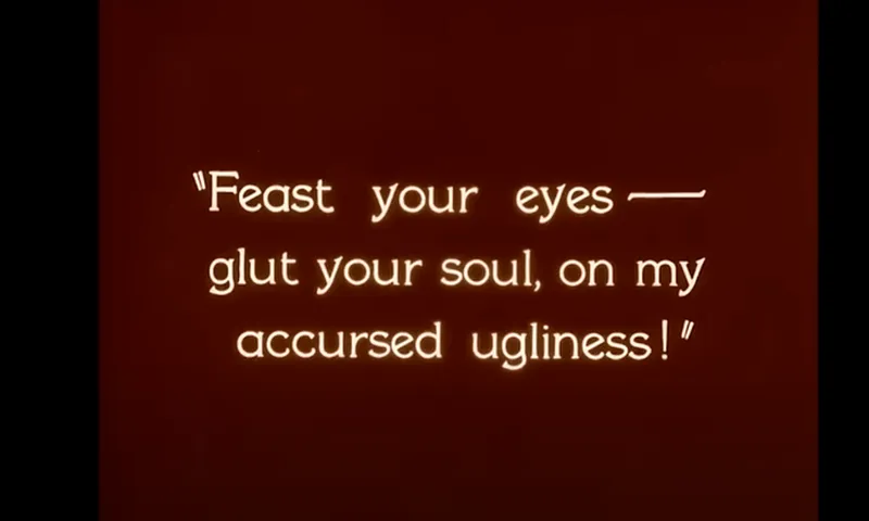 A title-card from Phantom of the Opera: Feast your eyes, glut your soul on my accursed ugliness!"