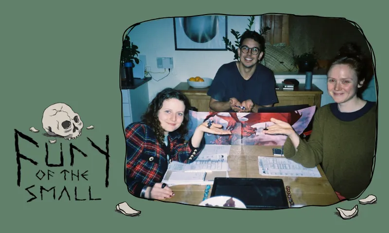A green frame with "fury of the small" in text and a skull illustration overlays an image of two women and a man playing dungeons and dragons
