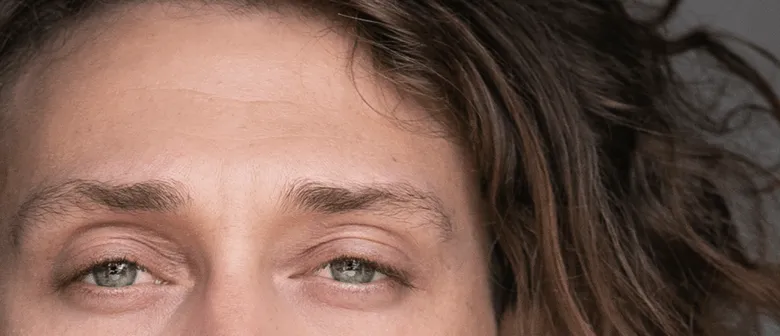 close up photo of someones forehead and eyes