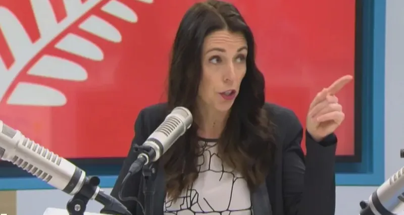 Jacinda Ardern points at Mark Richardson before harvesting his sweetmeats live on TV