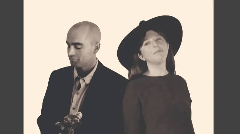 black and white photo of two indie musicians