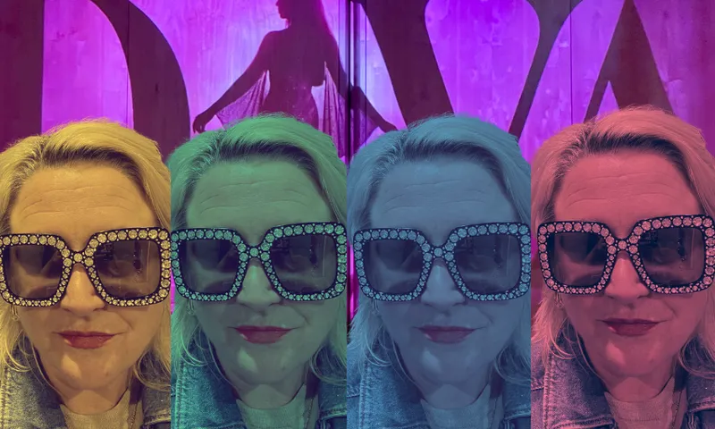 Four colorful, stylized images of a person wearing large, jeweled sunglasses and red lipstick are arranged side by side. In the background, a silhouette of a woman and large letters spelling "DIVA" are visible.