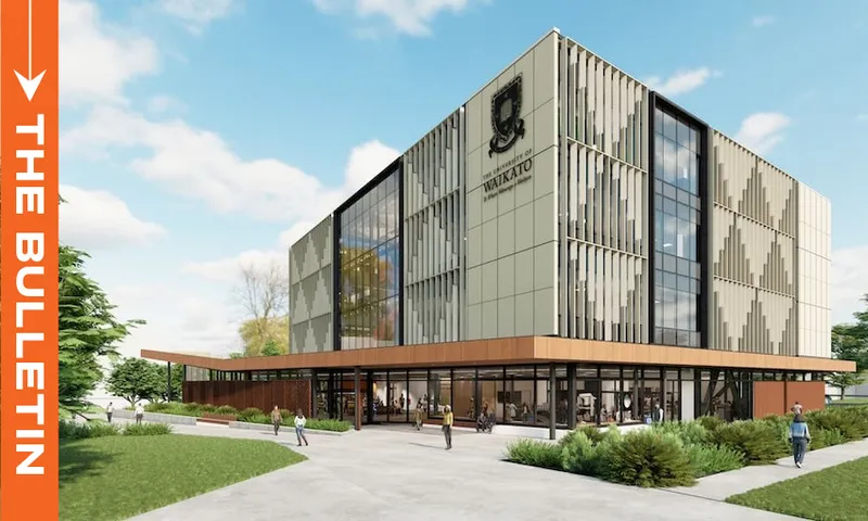 A modern, multi-story university building with large windows and the Waikato logo, surrounded by greenery. Several people are walking nearby. An orange vertical banner reads "THE BULLETIN" on the left side of the image.