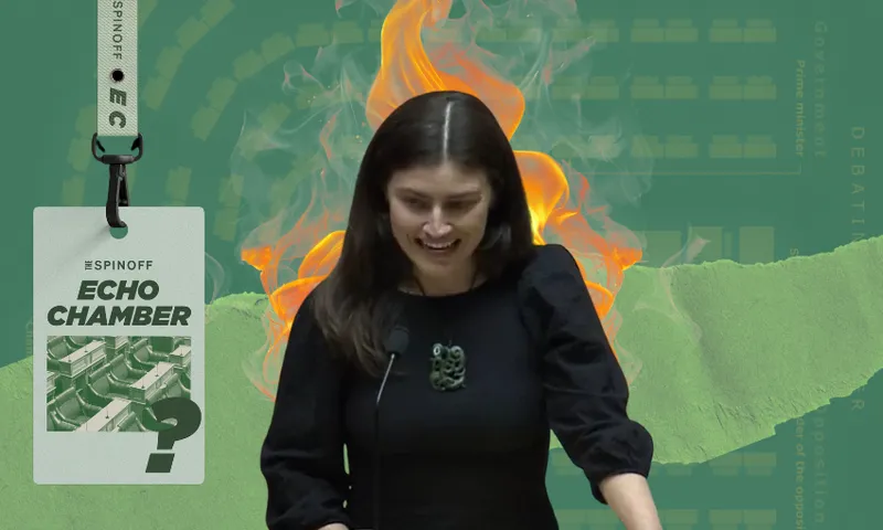 A woman against a green background, with flames behind her head