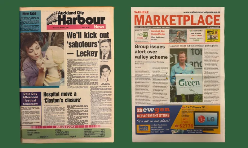 Two New Zealand newspapers are side by side. The left, "Auckland City Harbour News," features a woman holding a koala. The right, "Waiheke Marketplace," shows a crowd at an outdoor event and several colorful advertisements.