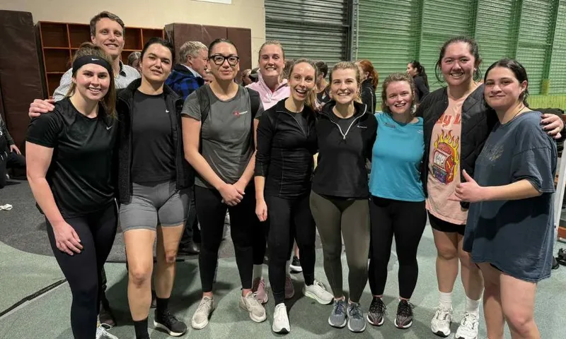 Group photo of the Gallery Gals netball team, from left: Abbey Wakefield, Adam Pearse (behind), Julia Gabel, Maiki Sherman, Bridie Witton, Anna Whyte, Sophie Trigger, Gia Garrick, Myrah Walters and Lyric Waiwiri-Smith.