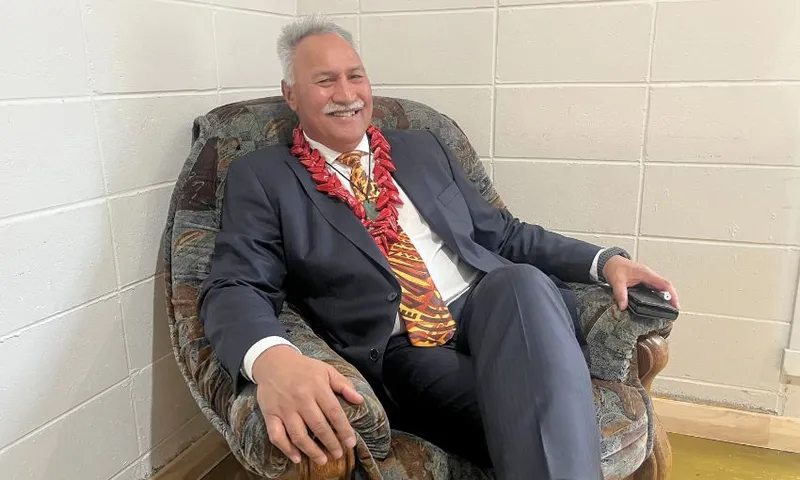 Laban, photographed sitting on an armchair in Wainuiomata marae.