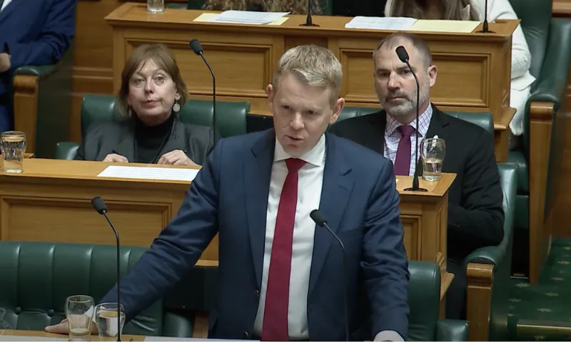 Chris Hipkins speaks to the House from his bench.