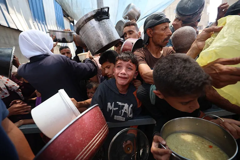 TOPSHOT-PALESTINIAN-ISRAEL-CONFLICT-AID