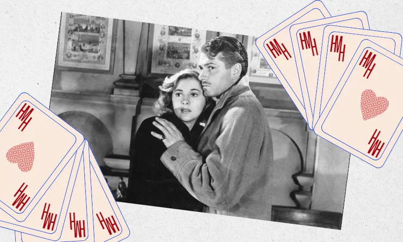A black-and-white photo of a man and woman embracing, overlaid with illustrated playing cards featuring red hearts and the letters "HH" in the corners.