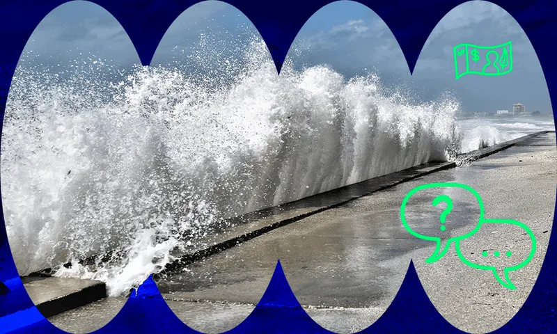 Waves crashing against a sea wall
