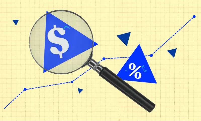 A magnifying glass hovers over a dollar sign inside a blue triangle, with a percentage symbol nearby and a rising dotted line graph in the background, symbolizing financial analysis.