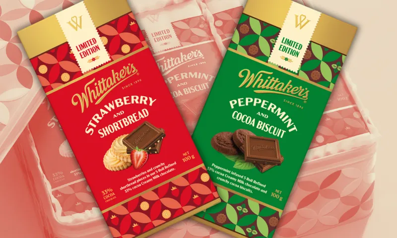 Two limited edition Whittaker’s chocolate bars, one Strawberry and Shortbread (red packaging) and one Peppermint and Cocoa Biscuit (green packaging), are displayed side by side against a blurred Whittaker’s box background.