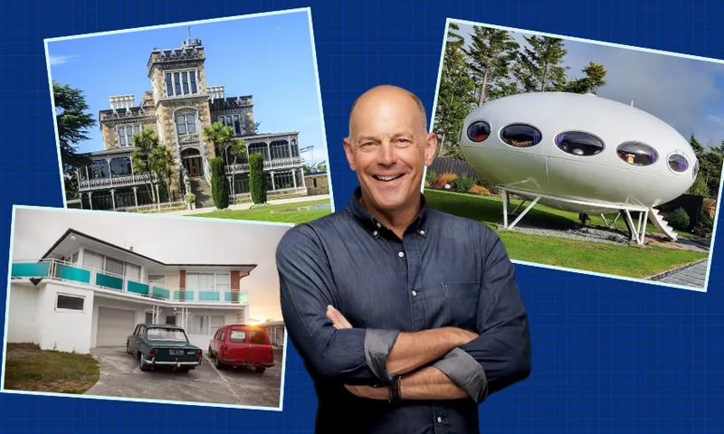 TV presenter Phil Spencer smiles at the camera with his arms folded. Behind him are photos of three different houses