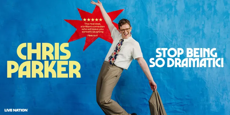 photo of chris parker wearing a tie and throwing his hand up