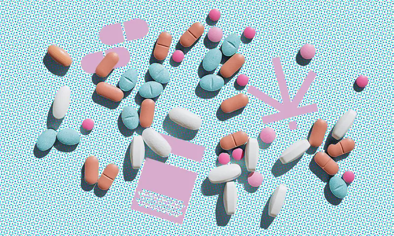 a stippled blue background with lots of little pills