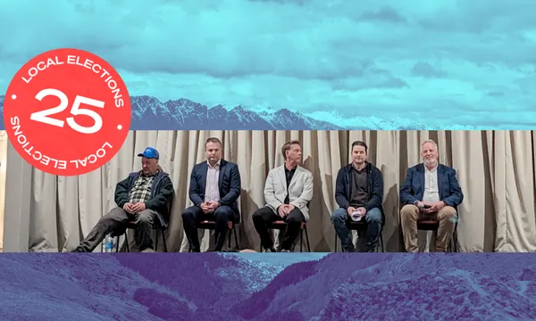 a blue tinted photo of queenstown then four white men in degrees of smart casual sidding in front of a curtain