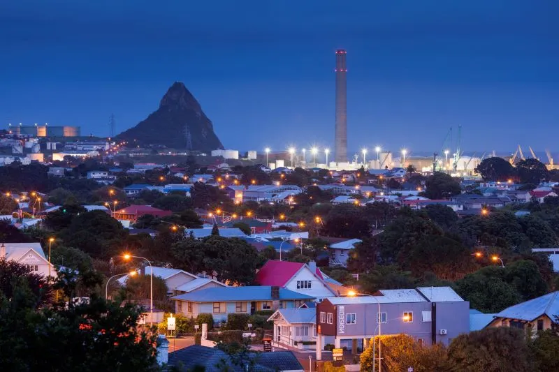 A shot of New Plymouth at night, with Paritutu in the background