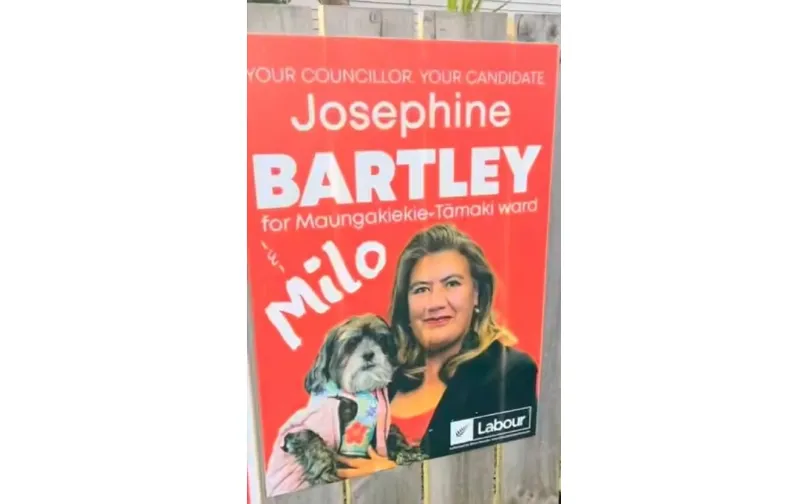 A red campaign sign features Josephine Bartley, a Labour candidate for Maungakiekie-Tamaki ward, holding a small dog named Milo. Both are looking at the camera, and the sign includes the Labour Party logo.