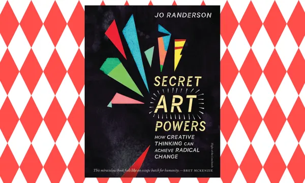 The cover of the book Secret Art Powers by Jo Randerson which is black with vibrant shapes on it. The background is a red harlequin pattern.
