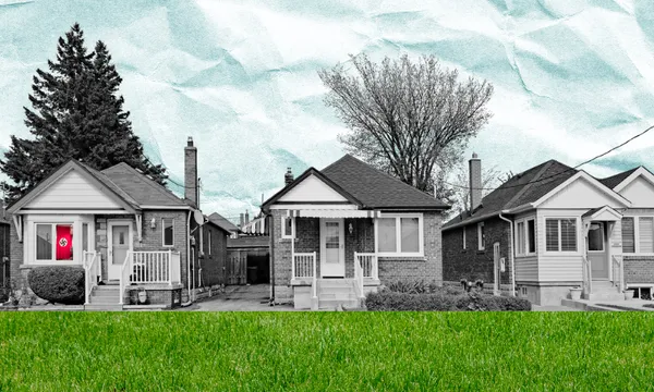 A greyscale neighbourhood with one window displaying a Nazi flag