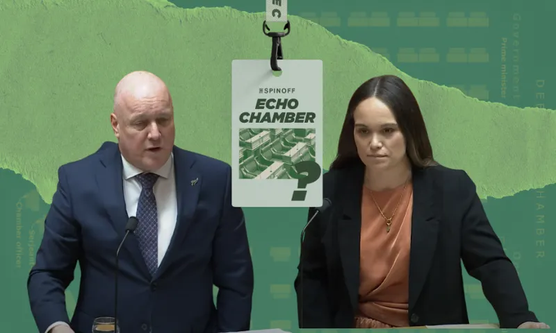 A man in a suit and a woman in a black blazer stand at podiums against a green background. An ID badge reading "#SPINOFF ECHO CHAMBER ?" hangs between them.