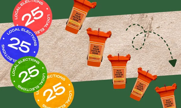 Colorful "Local Elections 25" stickers and several orange ballot boxes labeled "Put your vote in here" are scattered on a green and tan background. A dashed arrow points toward the bottom right corner.