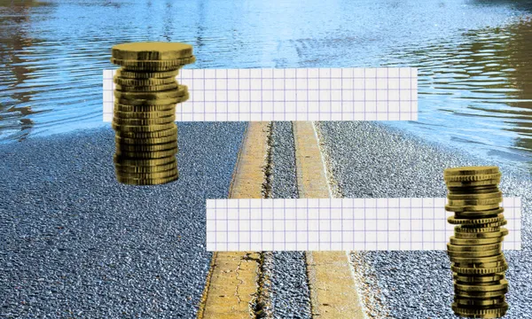 a picture of a road that is flooded with some coins and graph paper