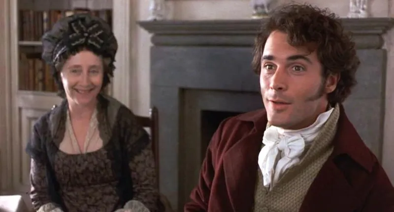 A still from the film Sense and Sensibility showing the actor Gemma Jones and Greg Wise who play Mrs Dashwood and Willoughby.