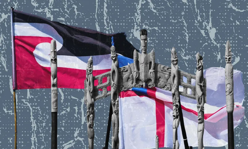 The Tino Rangatiratanga and New Zealand flags wave behind carved Māori wooden figures and a traditional gateway against a patterned blue background.