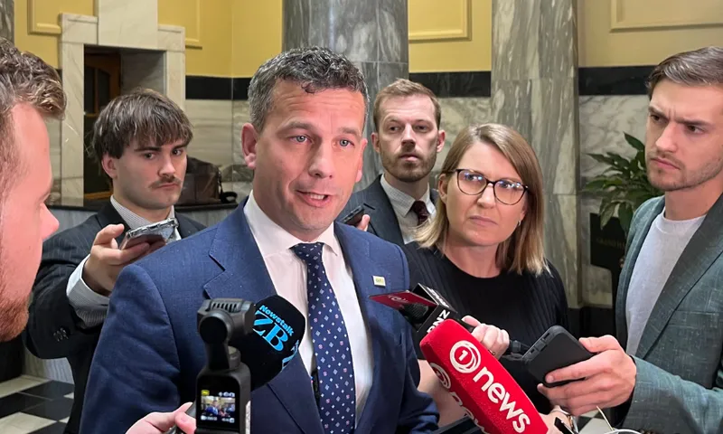 David Seymour speaking to reporters in parliament building.