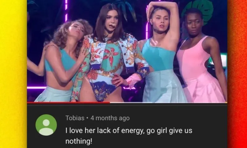 A screenshot of the "go girl, give us nothing" comment from a video of Dua Lipa's performance.