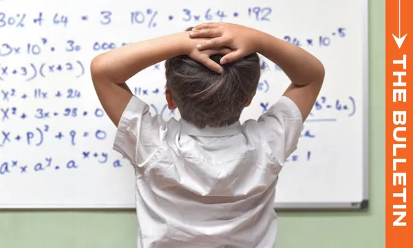 A child stands with hands on head, facing a whiteboard covered in mathematical equations, looking puzzled. An orange vertical banner on the right reads "THE BULLETIN.