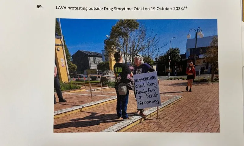 A photo of a LAVA protestor holding a sign reading: "drag culture start young family fun? Or fetish grooming."