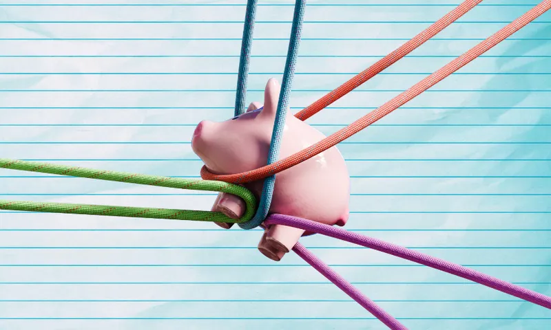 A pink piggy bank is held tightly by several colorful ropes against a lined, light blue background, symbolizing financial constraints or pressure.