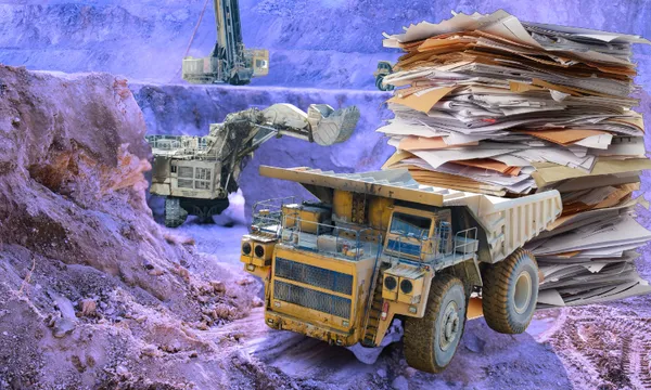 a purple background and some trucks and a huge pile of paper