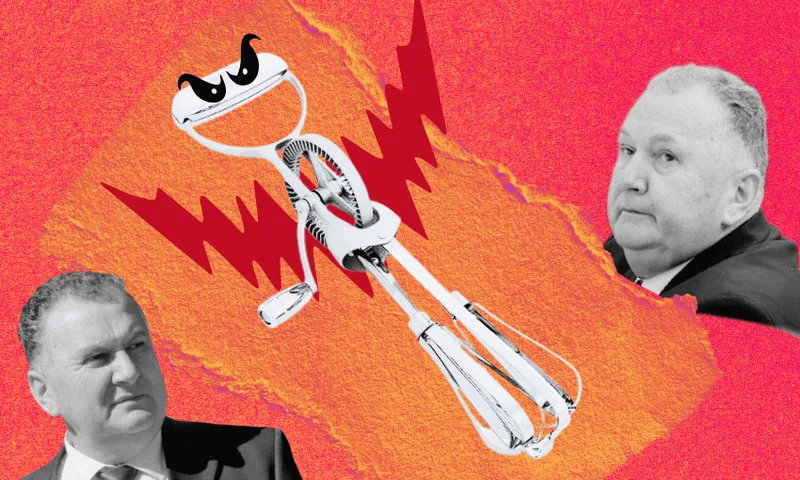 A manual egg beater with cartoon angry eyes and red lightning bolts is centered between two serious-looking men in suits, set against a textured red and orange background.