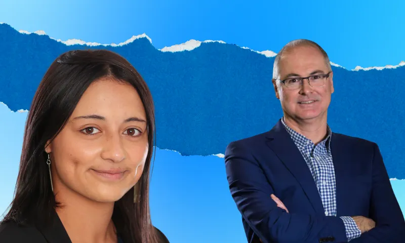 A woman with straight dark hair and a man in glasses and a navy blazer stand in front of a blue background with a torn paper design.