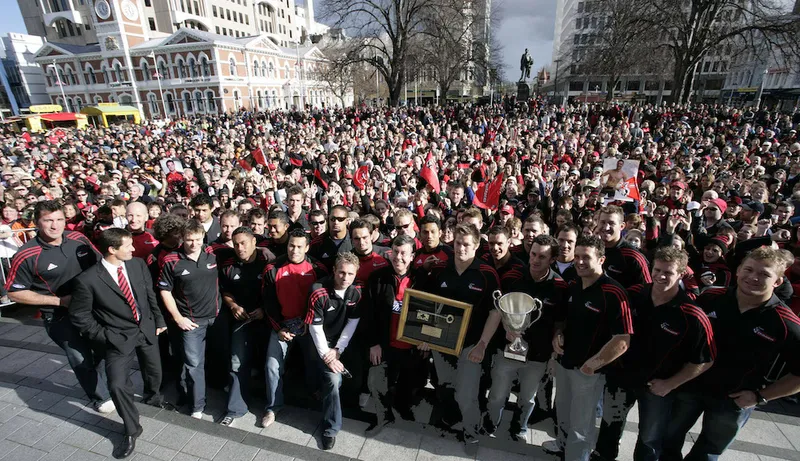 The Crusaders Team Hold The Super 12 Trophy And Th