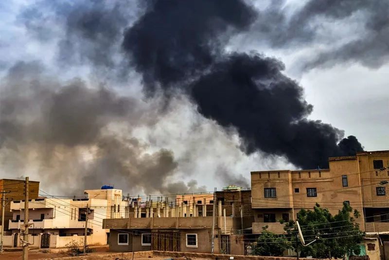 buildings with smoking fire
