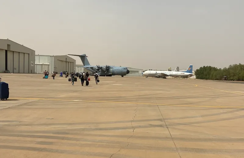 planes in hazy air on the tarmac