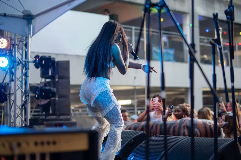 A performer at Cross Street Music Festival 2023.