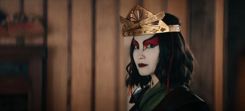 Suki, played by Maria Zhang, seen here in her war makeup, kimono and headress.