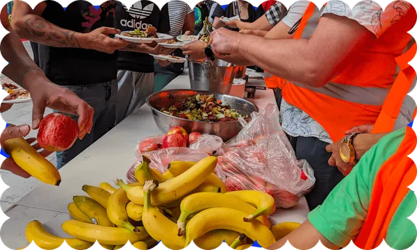 a big pile of bananas and people dishing up food